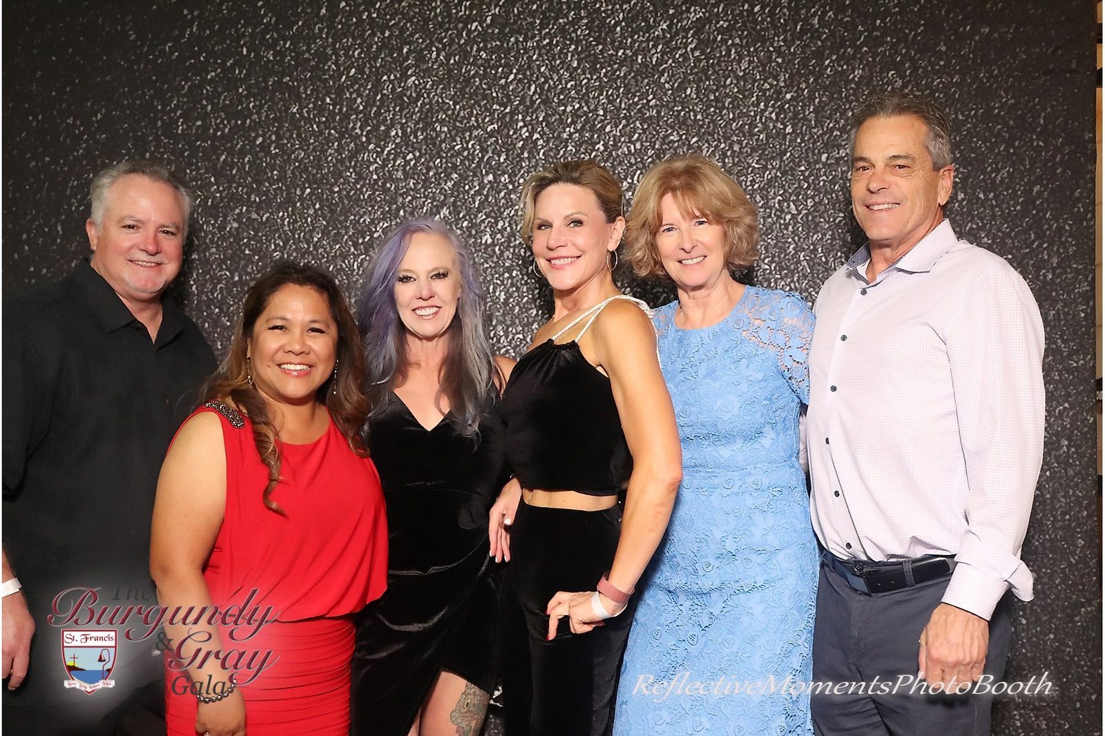 Wide shot of the mirror photo booth setup at the Burgundy and Grey Gala