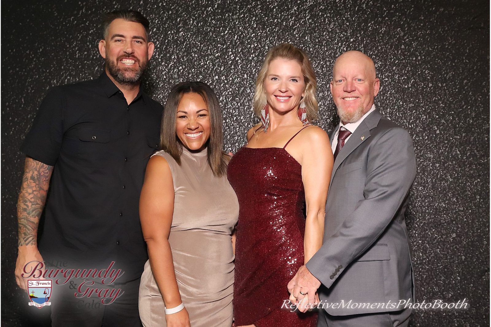 Group photo at the mirror booth during the Burgundy and Grey Gala