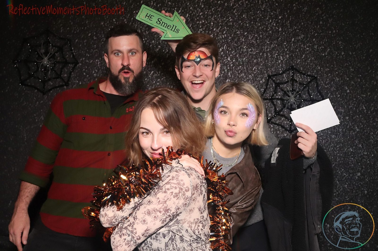 Final Halloween party group photo at the mirror booth