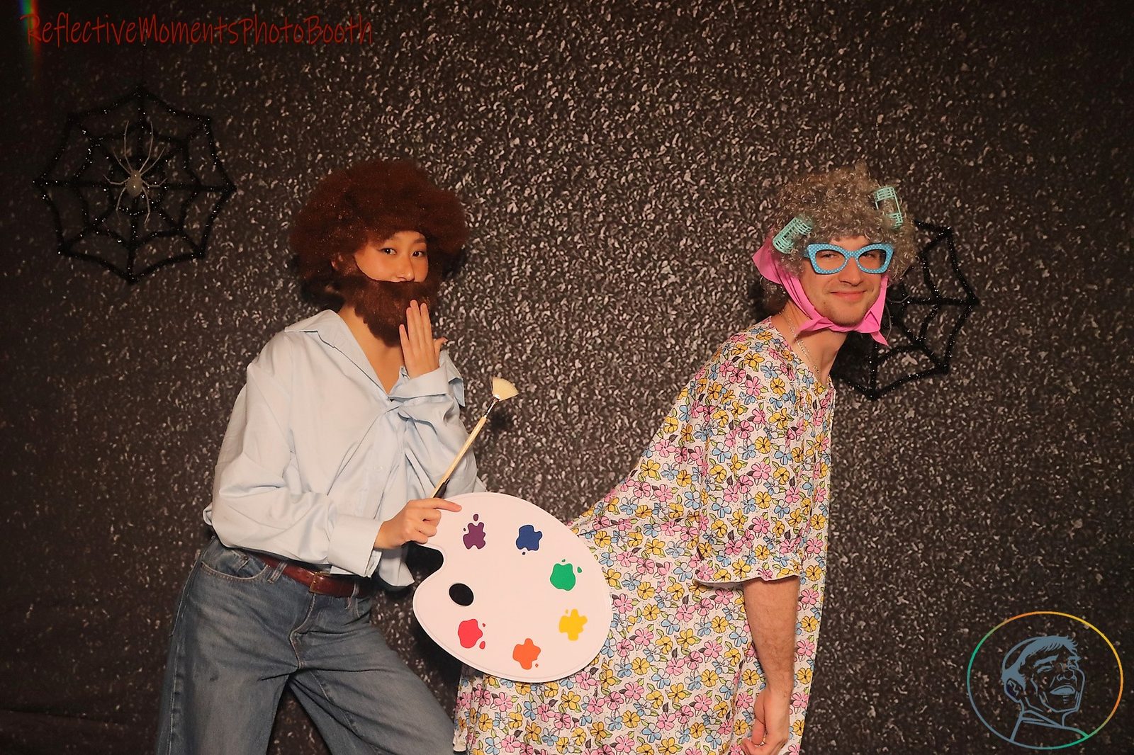 Guests in creative Halloween costumes at the photo booth