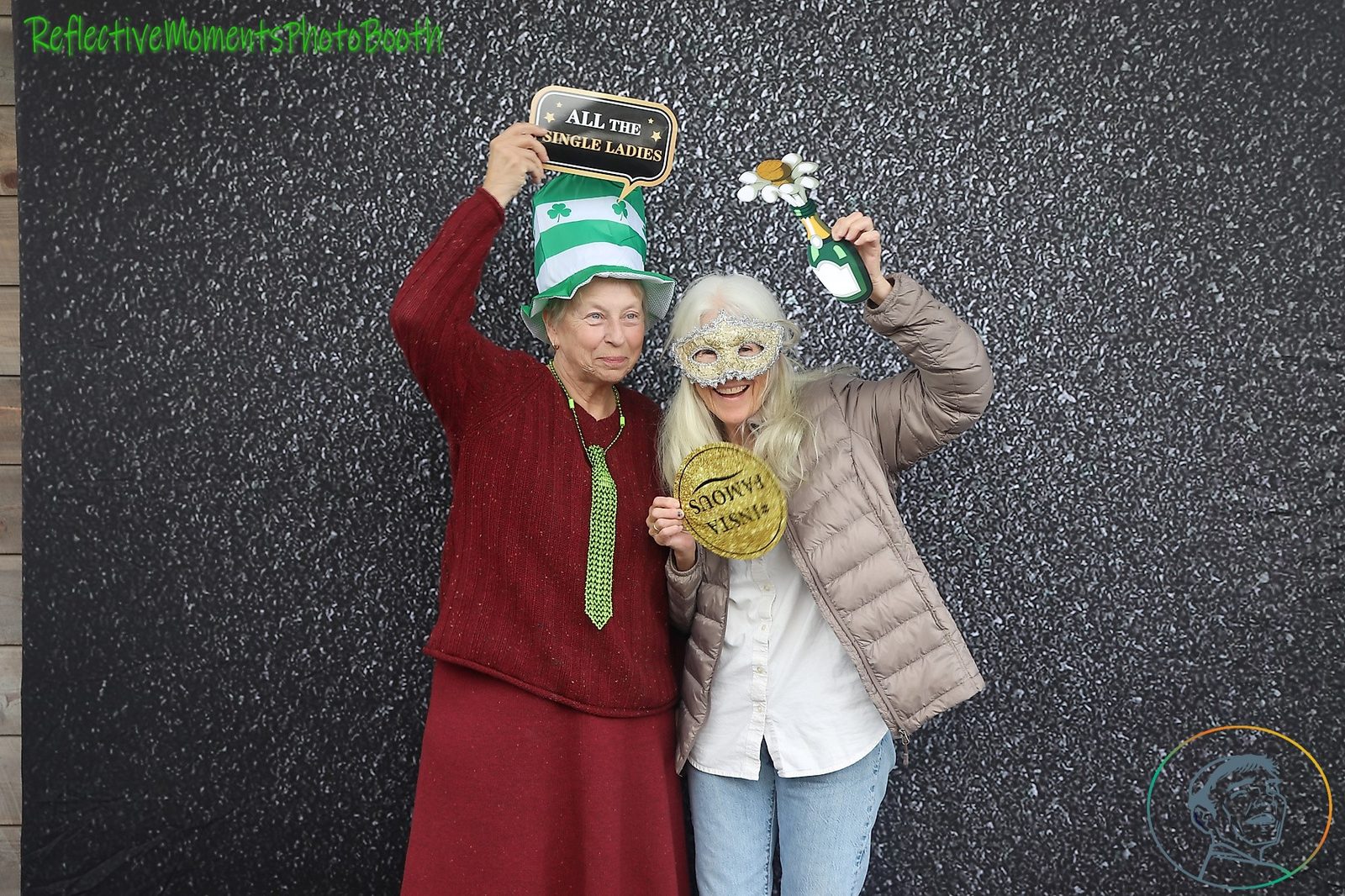 Saint Patrick's Day group celebrating at the mirror photo booth