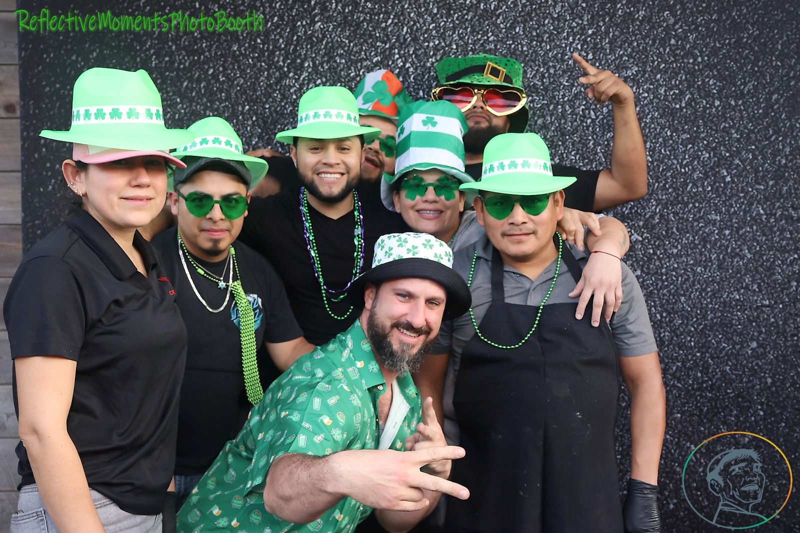 Group of friends at the mirror booth during Saint Patrick's Day celebrations