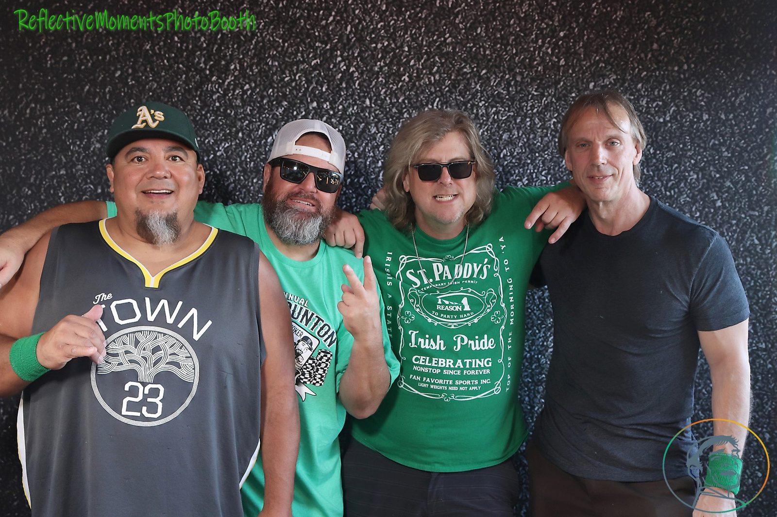 Guests enjoying the Saint Patrick's Day photo booth experience