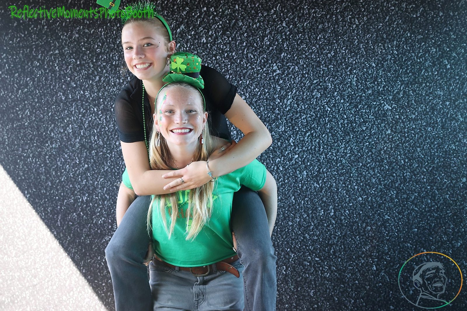 Couple posing at the mirror photo booth on Saint Patrick's Day