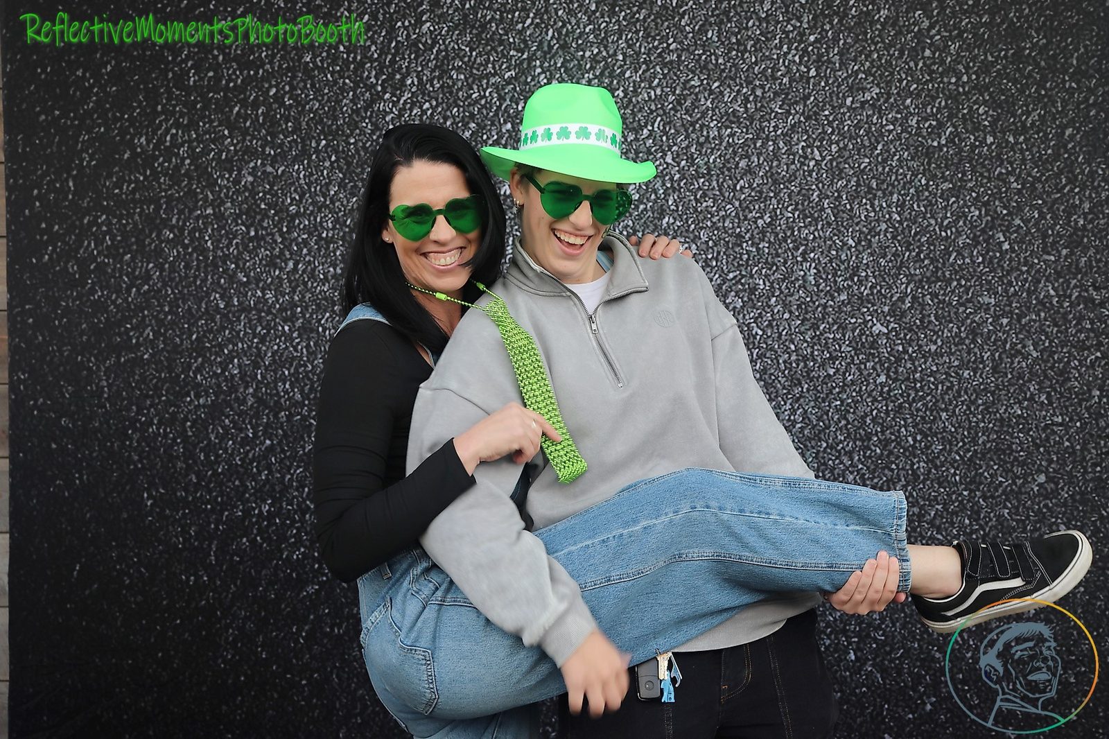 Guests celebrating Saint Patrick's Day at the mirror photo booth